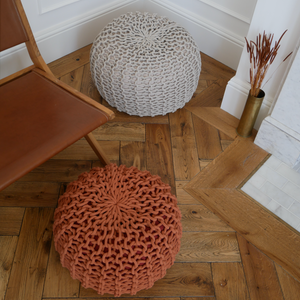 beige and copper knitted footstool or pouffe