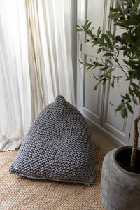 Grey beanbag chair in neutral living space